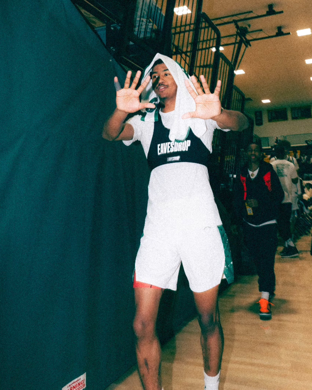 Athlete wearing an Eavesdrop mic’d-up vest